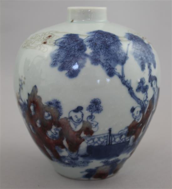 A Chinese underglaze blue and copper red small ovoid vase, Kangxi six character mark, early 20th century, 12cm